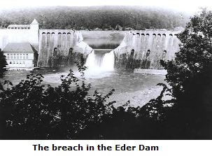 The breached Eder dam in full flood